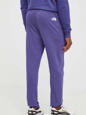 Bavlněné sportovní kalhoty The North Face fialové