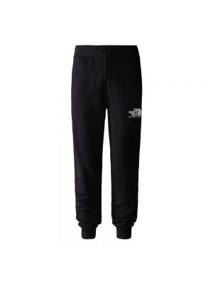 Spodnie sportowe bawełniane z kieszeniami z nadrukiem The North Face czarne