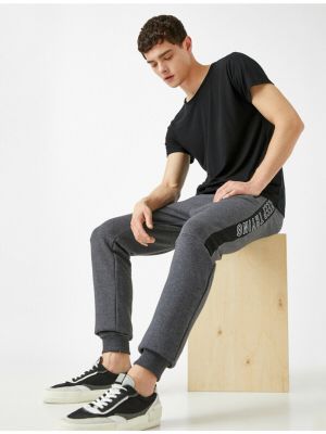 Pruhované sportovní kalhoty Koton šedé