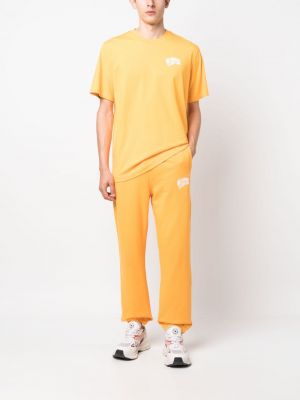 Spodnie sportowe bawełniane z nadrukiem Billionaire Boys Club pomarańczowe