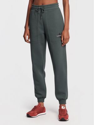 Slim fit priliehavé teplákové nohavice Calvin Klein Jeans zelená