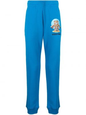 Памучни спортни панталони с принт Moschino синьо
