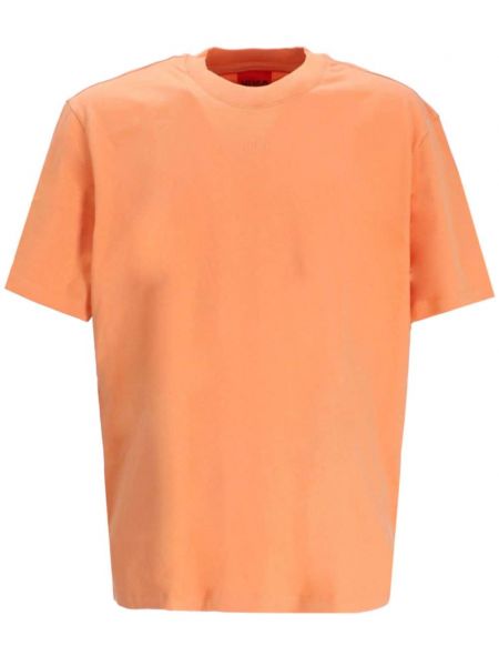 Bombažna majica s potiskom Hugo oranžna