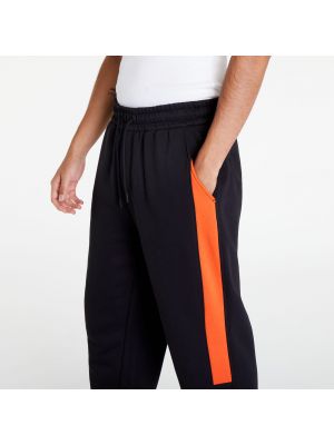 Αθλητικό παντελόνι σε φαρδιά γραμμή Calvin Klein