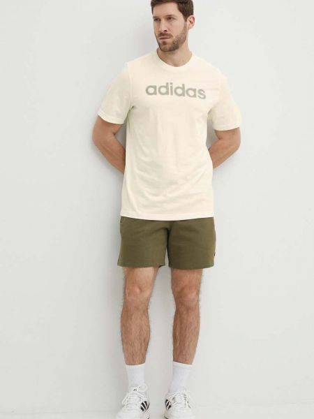 Koszulka bawełniana z nadrukiem Adidas beżowa
