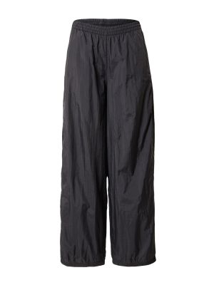 Jednofarebné nohavice s vysokým pásom s opaskom Adidas Originals - čierna