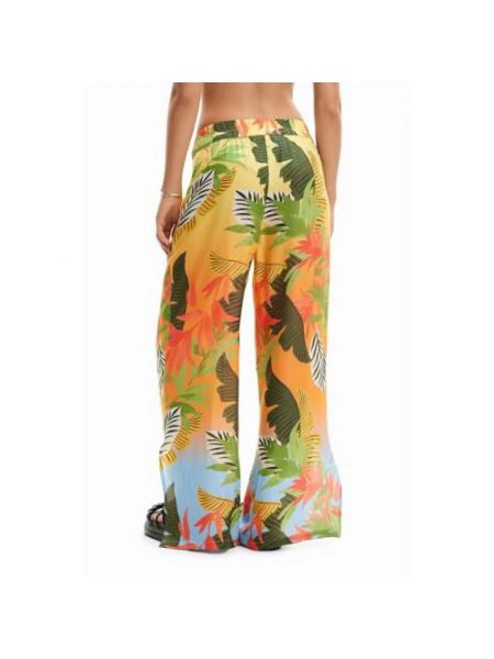 Pantalones con estampado tropical Desigual