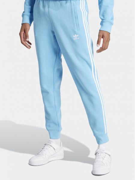 Pantaloni sport slim fit cu dungi Adidas albastru