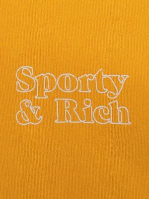 Mustriline puuvillased kapuutsiga pusa Sporty & Rich kollane