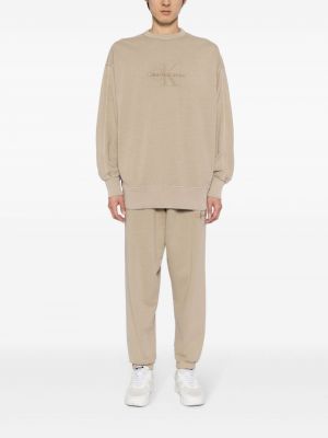Siuvinėtos sportinės kelnes Calvin Klein ruda