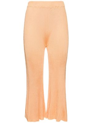 Viskózové kalhoty jersey Jil Sander oranžové