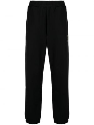 Sportovní kalhoty s výšivkou jersey Izzue černé