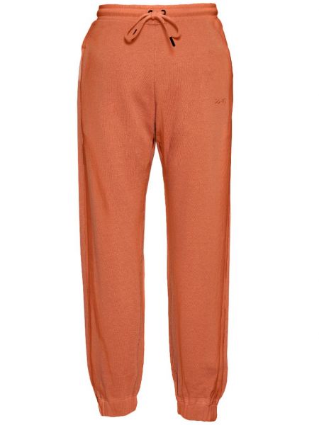 Spodnie sportowe Reebok X Victoria Beckham pomarańczowe