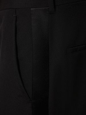 Vilnonis kostiumas Valentino juoda