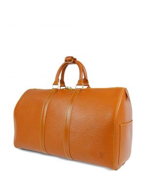 Cestovní taška Louis Vuitton zlatá