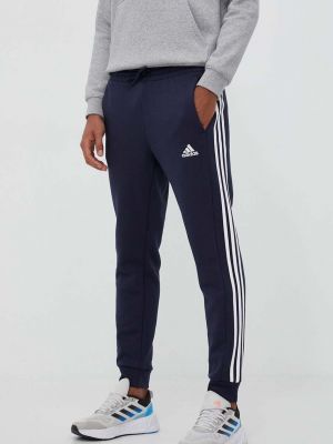 Pantaloni sport din fleece cu dungi Adidas albastru