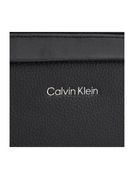 Riñonera de cuero con apliques Calvin Klein negro
