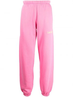 Sportovní kalhoty s výšivkou Late Checkout růžové