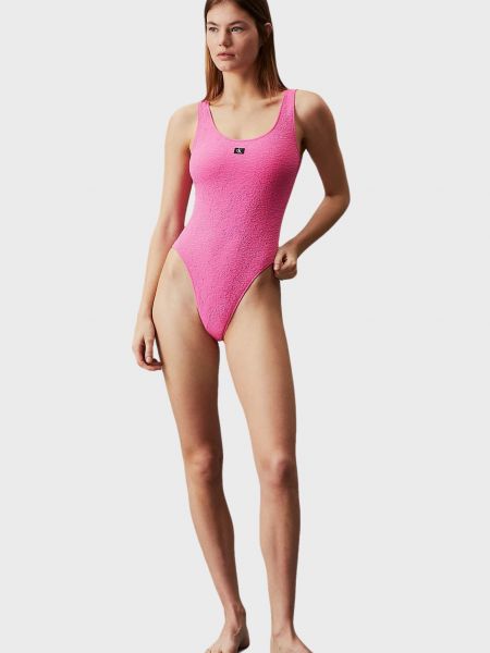 Суцільний купальник з вирізом на спині Calvin Klein рожевий