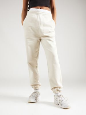 Hlače Tommy Jeans bijela