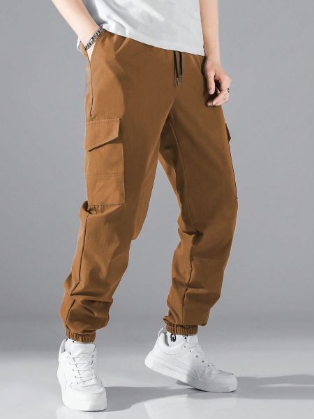 Однотонные брюки с карманами Manfinity коричневые