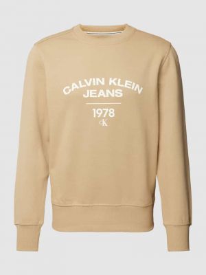 Sweter z nadrukiem Calvin Klein Jeans beżowy