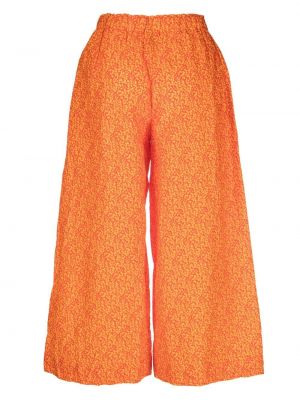 Spodnie w kwiatki z nadrukiem relaxed fit Daniela Gregis pomarańczowe
