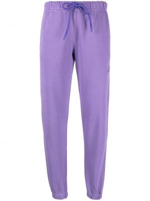 Bavlnené teplákové nohavice Autry fialová