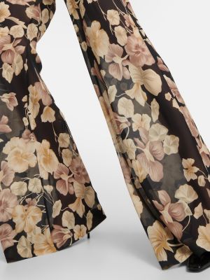 Voľné kvetinové hodvábne nohavice Saint Laurent čierna