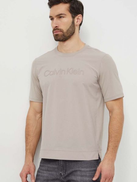 Koszulka Calvin Klein Performance beżowa