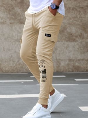Sportovní kalhoty Madmext béžové