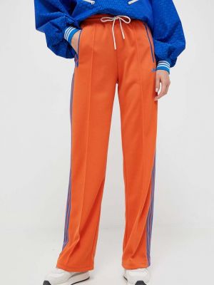 Spodnie sportowe Adidas Originals pomarańczowe