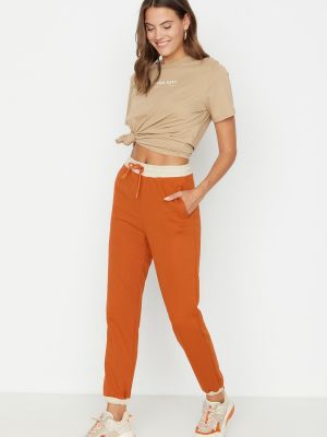 Teplákové nohavice Trendyol oranžová