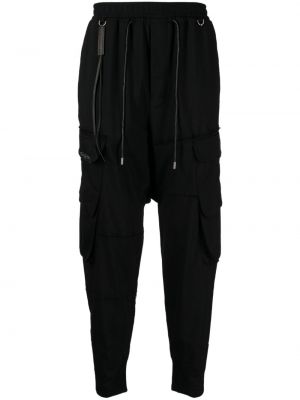 Vlnené teplákové nohavice s potlačou Mastermind Japan čierna