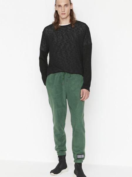 Fleecové sportovní kalhoty Trendyol zelené