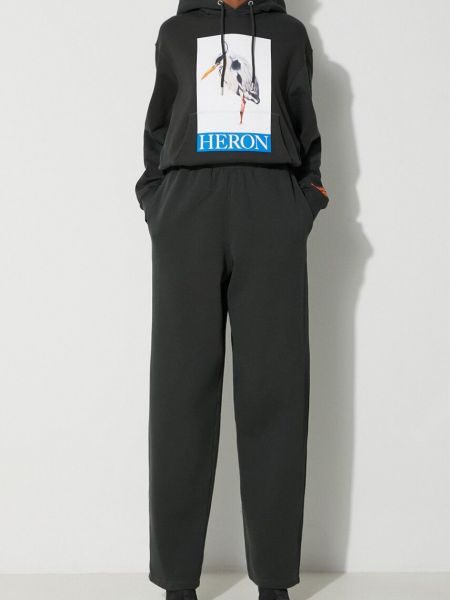 Bavlněné sportovní kalhoty s potiskem Heron Preston černé