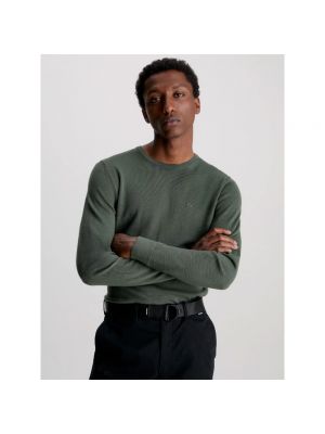Sweter z wełny merino Calvin Klein zielony