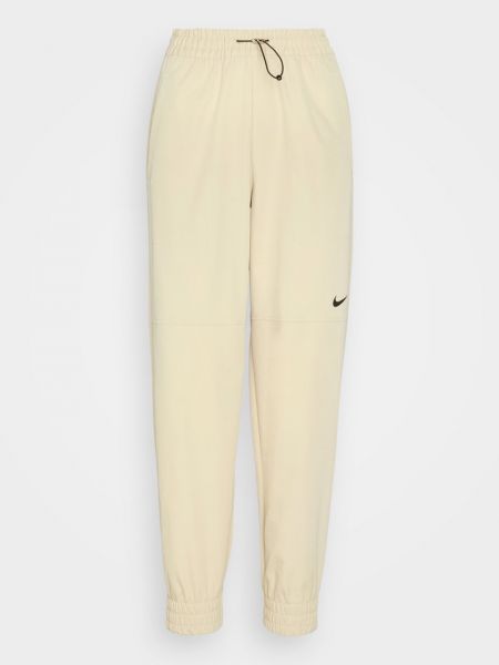 Spodnie sportowe Nike Sportswear beżowe