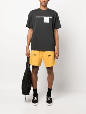 Shorts de sport à imprimé Omc jaune