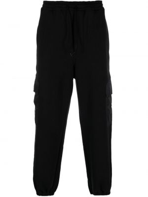 Spodnie sportowe bawełniane z kieszeniami Comme Des Garcons Homme czarne