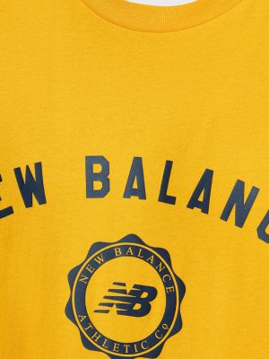 Футболка New Balance желтая