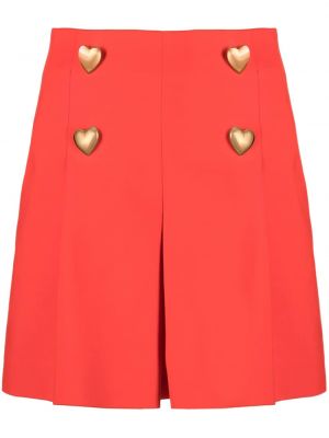 Shorts à boutons de motif coeur Moschino rouge