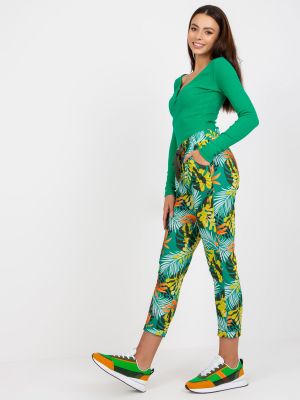 Teplákové nohavice s vreckami Fashionhunters zelená