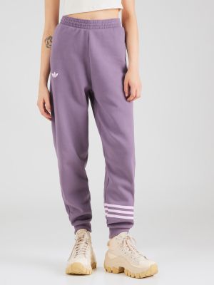 Teplákové nohavice Adidas Originals fialová