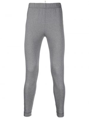 Úzké kalhoty skinny fit s potiskem Moncler Grenoble šedé