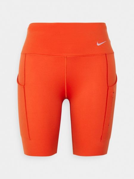 Legginsy Nike Performance pomarańczowe