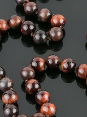 Ожерелье бусики-колечки коричневое
