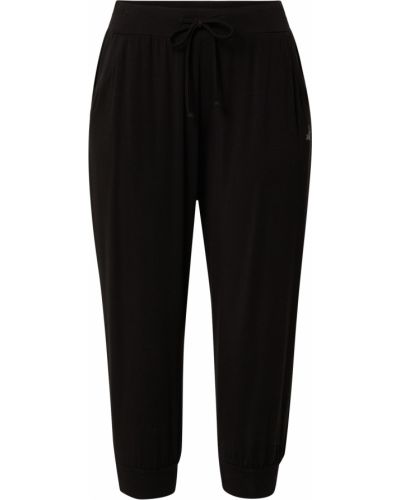 Jednofarebné viskózové teplákové nohavice s opaskom Curare Yogawear - čierna