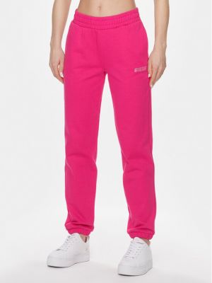 Sportovní kalhoty Guess růžové