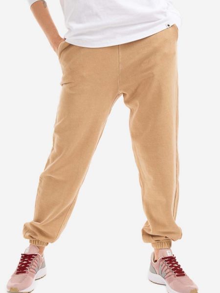 Spodnie sportowe bawełniane Carhartt Wip brązowe